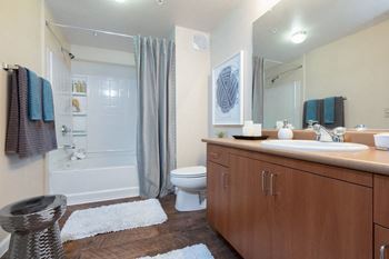 Relaxing oval soaking tubs with shelving in every home